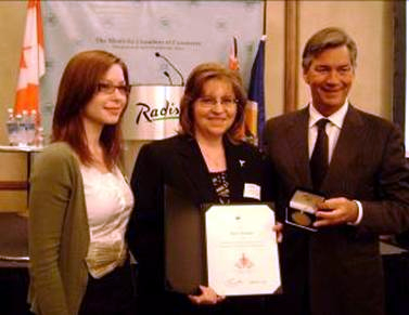 Photo of COF Award Recipient Anita Martens with her daughter Stephanie and Premier Gary Doer
