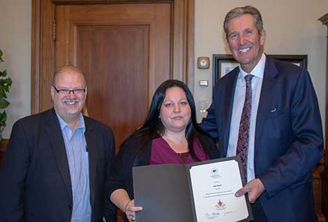 Photo of Honourable Kelvin Goertzen,  Minister of Education and Training; Julie Black; and Honourable Brian Pallister, Premier of Manitoba