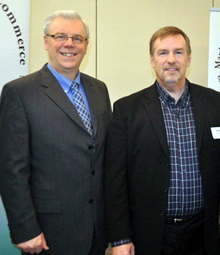Le premier ministre Selinger et Michael Moore