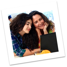 Mother and Daughter looking at laptop