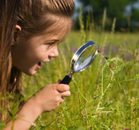 Girl with Magnifying Glass